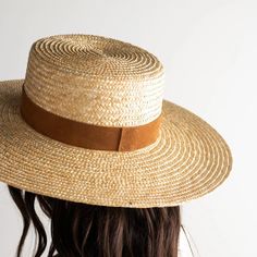 Capri Medium Straw Boater Hat - Natural - GIGI PIP Adjustable Handwoven Straw Hat For Kentucky Derby, Handwoven Adjustable Straw Hat For Kentucky Derby, Woven Straw Panama Hat With Flat Brim, Elegant Straw Panama Hat With Flat Crown, Elegant Panama Hat With Flat Crown, Handwoven Toquilla Straw Boater Hat, Handwoven Toquilla Straw Boater Hat With Curved Brim, Bohemian Palm Leaf Boater Hat With Short Brim, Classic Brimmed Woven Straw Hat