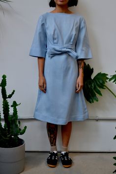 "Sixties Powder Blue Dress. Zipper Closure Up Back. Bow Belt Detail. Elbow Length Bell Sleeves. Unlined. No Content Label, Feels Like A Blend. Excellent Vintage Condition - Tiny Stain On Front. Minor Wear. Fits Size Extra Small Chest - 31\" Waist - 26\" Hip - 33\" Shoulder to Shoulder - 14.5\" Shoulder to Hem - 36\" Sleeve Length - 13\" All Sales Are Final. We have taken the time to note all size measurements and the condition of each piece so please look over all the information of the garment Powder Blue Dress, Blue Party Dress, Bow Belt, Blue Party, Dress Zipper, Small Chest, Powder Blue, Dress Clothes For Women, Blue Dress