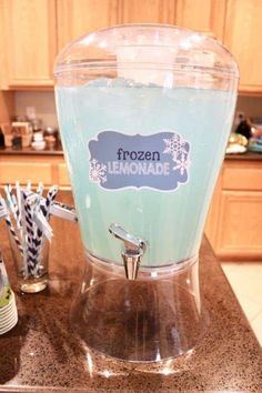 a frozen lemonade blender sitting on top of a counter