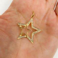 14K Solid Gold and Diamond Double Star Charm 26x28mm, shiny gold necklace pendant, celestial charm, two stars solid gold pendant charm. Metal: 14k Solid Gold Gemstone: Diamonds Size: 26x28mm Thickness: 2mm Item number: GDP79 Processing time: 1-2 business days Please note that color may slightly vary due to monitor color restrictions. We offer FREE domestic shipping for orders $35 and up We carry the highest quality of sterling silver, gold filled chains, various jewelry findings, supplies and ch Luxury Gold Plated Jewelry With Star Charm, Yellow Gold Star Charm Pendant Necklace, Gold Star-shaped Jewelry With Charms, Yellow Gold Star-shaped Jewelry With Charms, Gold Plated Star Charm Necklaces, Gold-plated Star Charm Necklaces, Celestial Star Charm Pendant Necklace, Gold Star-shaped Jewelry With Star Charm, Celestial Yellow Gold Charm Necklaces With Star Charm