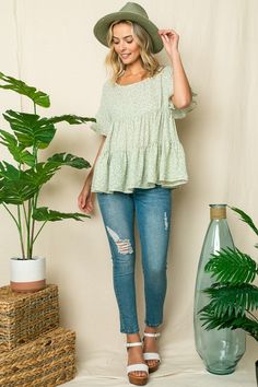 This breezy tiered babydoll blouse is designed with ruffle sleeves and a tied-and-cutout back. Material: 100% polyester Stretch: No stretch Care: Machine wash cold, gentle cycle, do not bleach, tumble dry low. Made in USA Model is 5' 8" 31-24-35 and wearing a Small Product Measurements S: 36.0-38.0” (Bust) M: 38.0-40.0” (Bust) L: 40.0-42.0” (Bust) Burgundy Outfit, Babydoll Shirt, Babydoll Blouse, Petal Sleeve, Animal Prints Pattern, Usa Outfit, Pattern Animal, Sweaters And Leggings, Babydoll Top