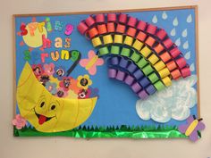 a colorful bulletin board with crayons and pencils on it