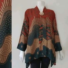 Standard Size: Size S Bust 90 cm Size M Bust 94 cm Size L Bust 98 cm Size XL Bust 104 cm Size XXL Bust 110 cm Size XXXL Bust 120cm blouse length 70cm Fabric 100% cotton Fashions batik cloth, Soft Fabric Neat stitches How to care for Batik clothes 1. Batik clothes should be washed using lerak liquid or soap and not soaked so that the color lasts 2. Don't dry it directly in the sun, just let it air out so the color doesn't fade quickly. 3. We recommend that when storage is hung, if it is folded, i Bohemian Long Sleeve Blouse With Abstract Print, Green Bohemian Top With Batik Print, Patterned Batik Print Long Sleeve Tops, Traditional Batik Print Tops For Festival, Traditional Batik Print Festival Tops, Bohemian Multicolor Blouse With Batik Print, Bohemian Multicolor Batik Print Blouse, Casual Multicolor Batik Print Blouse, Traditional Batik Print Patterned Blouse