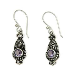 Bali artisan Wayan Asmana was reminded of squid when crafting these sterling silver earrings with their unusual shape. The earrings feature traditional Balinese dot motifs accented by a darkly oxidized background. Completing the design are sparkling lilac-hued amethysts..925 Sterling silver Ornate Purple Dangle Earrings, Ornate Purple Dangle Jewelry, Ornate Purple Pierced Earrings, Ornate Purple Sterling Silver Earrings, Bohemian Purple Sterling Silver Earrings, Traditional Purple Drop Earrings, Traditional Sterling Silver Drop Jewelry, Purple Sterling Silver Drop Earrings, Traditional Purple Dangle Earrings