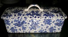 a blue and white box sitting on top of a counter