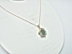 "For Sale: (1) H280 Stunning 14k Yellow Gold Emerald Necklace with Multiple Diamonds PLEASE READ ENTIRE DESCRIPTION BEFORE PURCHASING Pre-owned item. This is beautiful 14k yellow gold necklace featuring pear shaped Emerald in the center with multiple diamonds of different shape around it. No visible flaws, just some scratches please see pictures for details. Sold as is, as seen on pictures. There are earrings available that go with this necklace, and those earrings sold separately. Specifics: * 14k Yellow Gold Emerald Necklace With 17 Jewels, Fine Jewelry Custom Pendant Necklace For Wedding, Fine Jewelry Diamond Pendant Necklace With 17 Jewels, Antique Yellow Gold Necklace With Diamond Accents, Oval Yellow Gold Diamond Necklace With Gemstone, Wedding Oval Emerald Necklace With Jewels, Heirloom Gemstone Necklace For Formal Occasions, Fine Jewelry Yellow Gold Emerald Necklace With Diamond Cut, Gold 14k Diamond Cut Emerald Necklace