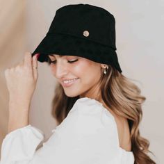 Our Clearwater Bucket Hat is the hat of the summer! This trendy style hat has a weaved like texture on it, is adjustable, and available in black and cream. Style it with your favorite summer outfit for a complete look! Measurements: Circumference 23" / Brim 2.5" Materials: 100% Polyester Adjustable Brimmed Bucket Hat For Day Out, Chic Adjustable Brimmed Bucket Hat, Chic Adjustable Bucket Hat, Chic Adjustable Wide Brim Bucket Hat, Chic Lightweight Bucket Hat, Chic Woven Bucket Hat With Short Brim, Chic Woven Bucket Hat, Adjustable Everyday Crochet Hat, Chic Bucket Straw Hat