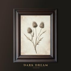 the dark dream artwork is hanging in a brown frame with gold lettering and flowers on it