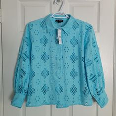 In Airy Eyelet Fabric With Buttons Down The Front. Gorgeous J.Crew Popover Eyelet Lace Blouse. Long Puffy Sleeve. Bright Blue. Cropped Length. New With Tags. Lined With Detached Tank Top. Spring Eyelet Button-up Top, Turquoise Long Sleeve Cotton Top, White Eyelet Button-up Blouse, Washed Blue Button-up Top With Patch Pockets, Blue Shirt With 3/4 Sleeve And Button Closure, Eyelet Fabric, Eyelet Lace, Lace Blouse, Blue Turquoise