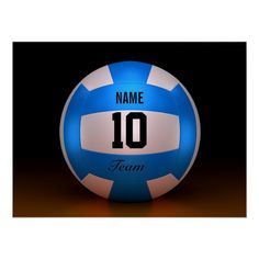 a blue and white volleyball ball with the number 10 on it's side, in front of a black background