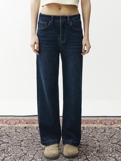 The displayed trousers are a classic five-pocket style, a common design in casual bottoms. They are constructed with a straight-leg fit, which is versatile and flattering for various body types. The trousers have a sturdy waistband with belt loops and a front closure, indicating a traditional and functional design.- The stitching details are prominent, suggesting strong construction and durability.- There's a lack of fading or distressing, which often indicates a more formal or clean look in denim garments.- These trousers appear to be a staple piece, capable of being dressed up or down for different occasions. Classic High Rise Flare Jeans, Classic Dark Wash Flare Jeans, Classic Wide-leg Denim Blue Jeans, Classic Wide Leg Denim Blue Jeans, Classic Flare Jeans With Straight Hem And Five Pockets, Classic Dark Wash Wide Leg Pants, Classic Straight Flare Jeans With Five Pockets, Classic High Rise Pants With Five Pockets, Classic Straight Denim Bottoms