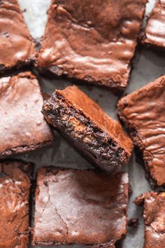 chocolate brownies cut into squares on top of each other