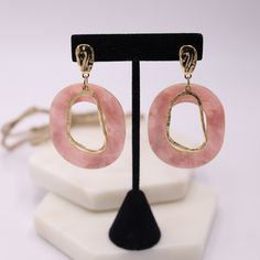 Charming irregular resin earrings, featuring a white acrylic geometric shape with an irregular oval gold finish metal design. Inspired in our summer earrings collection to wear as you like for a casual look or to add to a cute dress for a statement look. Approx size: 2.67inches x 1.57 inches 13 g Summer Earrings, Pink Acrylics, Summer Earring, Resin Earrings, White Acrylic, White Acrylics, Acrylic Earrings, Geometric Earrings, Earrings Collection