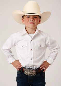 Upgrade your young cowboy's wardrobe with this high-quality Roper Boys Long Sleeve Snap Solid Poplin Shirt. The solid design with snap closure and 2 pockets give it a classic Western look, while the durable poplin fabric ensures long-lasting wear. Perfect for any occasion, whether it's a day on the ranch or a special event. Classic Shirt With Pockets For Rodeo, Western Style White Shirt For Fall, White Western Shirt For Fall, Classic Shirt With Snap Buttons For Rodeo, White Western Style Cotton Shirt, White Cotton Western Shirt, Western-themed Cotton Shirt With Button Closure, Western Look, Long Sleeve Kids