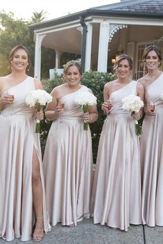 the bridesmaids are all wearing different styles of dresses