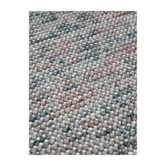 an area rug with various colored dots on it