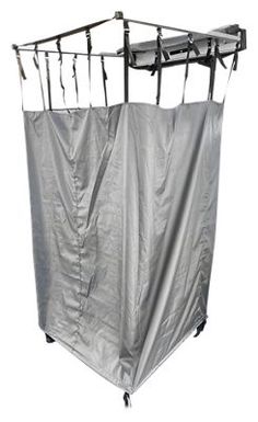 a metal garment rack with clothes hanging on it's sides and an overhang