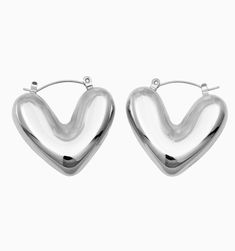 These are lightweight and waterproof! We love these gorgeous heart earrings for the size and chicness. Style these earrings up for a fun night out or make them an essential part of your daily line up.
Size:1.2" Modern Heart Earrings For Everyday, Trendy Hoop Earrings With Heart Charm, Trendy Sterling Silver Heart Earrings For Everyday, Modern Everyday Heart Earrings, Trendy Heart Charm Earrings, Trendy Heart Hoop Earrings For Party, Trendy Heart-shaped Hoop Earrings For Everyday, Trendy Heart-shaped Hoop Earrings For Party, Trendy Silver Single Heart Earring