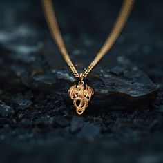 PENDANT INFORMATION This pendant is made of real, solid gold.• Made in USA• Size: Mini• Material: 14k or 18k solid gold• Finish: polished• Height: 1" (26 mm) | *includes the small circle, bail dimensions not included• Width: 0.8" (20,5 mm)• Pendant weight (approx.): 3 grams (14k)• Bail: fits up to 4 mm chains• Solid back, not hollow• A certificate of authenticity is included• Delivered in our elegant jewelry box, making it the perfect giftPlease note: Our Mini sized pendants are small and delica Spiritual Ceremonial Jewelry That Is Tarnish Resistant, Mystical 14k Gold Jewelry Gift, Bronze Tarnish Resistant Pendant Jewelry, Mystical Yellow Gold Jewelry For Gift, Symbolic Hand Forged 14k Gold Jewelry, Ceremonial 14k Gold Round Pendant Jewelry, Symbolic Rose Gold Plated Jewelry, Symbolic 14k Rose Gold Jewelry, Mystical 14k Yellow Gold Jewelry