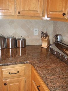 the kitchen counter is clean and ready to be used as a cook's utensil holder