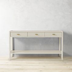 a white console table with two drawers