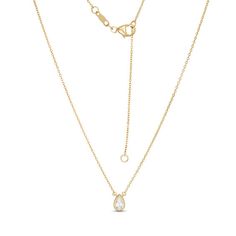 Perfectly petite, this vintage-inspired diamond necklace is an adorable look she'll never want to take off. Crafted in warm 10K gold, this anytime style showcases a sparkling 1/5 ct. pear-shaped diamond solitaire in an intricate milgrain-lined bezel setting. Polished to a bright shine, this design suspends centered along a 16.0-inch cable chain with 2.0-inch extender that secures with a lobster claw clasp. Classic 14k Gold Teardrop Diamond Necklace, Classic 14k Gold Teardrop Pendant Diamond Necklace, Classic Yellow Gold Pear Shaped Diamond Necklace, Dainty Pear-shaped Diamond Necklace, Pear Shaped Yellow Gold Necklace With Single Cut Diamonds, Yellow Gold Pear-shaped Necklace With Single Cut Diamonds, Pear-shaped Yellow Gold Necklace With Single Cut Diamonds, Yellow Gold Pear-shaped Rose Cut Diamond Necklace, Yellow Gold Pear-shaped Necklace With Rose Cut Diamonds