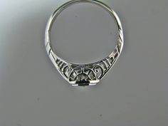 "For Sale: (1) H108 Gorgeous Diamond Ring in 14k White Gold from 1930's PLEASE READ ENTIRE DESCRIPTION BEFORE PURCHASING Please see pictures for more details! This stunning ring features a center 0.06 ct diamond. This is a beautiful filigree mounting down the side. The shank is decorated half way down. The ring is not stamped 14k, but was tested for it. This ring is from the 1930's. A beautiful piece for a any special occasion! What a great Gift! Specifics: *14k White Gold *Center Diamond approx Vintage 14k Stamped Sapphire Ring For Formal Occasions, 14k Gold Art Deco Jewelry, Heirloom Sapphire Ring With Polished Finish, Art Deco White Gold Rings Stamped 14k, White Gold Art Deco Rings Stamped 14k, Collectible Platinum Sapphire Ring, Classic Sapphire Ring With Polished Finish For Anniversary, Classic Polished Sapphire Ring, Classic Round Sapphire Ring With Polished Finish