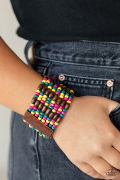 Held together with brown wooden rectangular frames, mismatched rows of oval brown and round multicolored wooden beads are threaded along stretchy bands around the wrist for a whimsically layered look. Sold as one individual bracelet. Wooden Bracelets, Dainty Band, Coil Bracelet, Mobile Boutique, Wooden Bracelet, Wood Bracelet, Bracelet Online, Paparazzi Accessories, Stretchy Bracelets