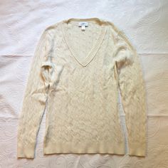 Cream Colored Cable-Knit Sweater With V-Neck. Super Cute Staple Piece! Approx. 26.5” Long, 16” Across Chest. Never Worn. In Excellent Condition. 46% Acrylic, 46% Nylon, 8% Rabbit Hair. Hand Wash. Full Care Information On Label. Open To Reasonable Offers. No Trades. Fitted Knit V-neck Sweater Casual Style, Fitted Knitted V-neck Sweater, Casual Fitted Knit V-neck Sweater, Fitted V-neck Knit Sweater, Casual Fitted Soft Knit V-neck Sweater, Fitted Soft Knit V-neck Casual Sweater, Fitted Soft Knit Casual V-neck Sweater, Cream Knit V-neck Sweater For Spring, Classic Cream V-neck Sweater For Spring