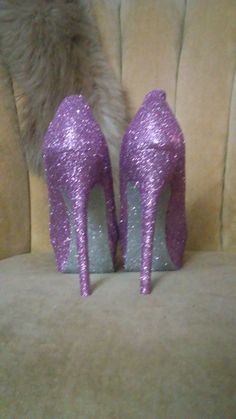 Lavender purple covers the entire top portion of the heels while the underside is covered in an ultra fine sliver glitter. These heels can be made in any color combo desired. If you would like another color combination please leave your color choices at checkout. All of our artwork is sealed with a water resistant sealant that helps to protect the artwork and avoid glitter fallout. This heel is available in additional colors and shoe styles. Contact us today for more color and style options. All Glamorous Purple Closed Toe Heels, Glamorous Purple Heels For Wedding, Pink Glitter High Heel Heels, Glamorous Purple High Heels, Lavender Open Toe Heels For Party, Lavender Heels With Pointed Toe For Party, Lavender Round Toe Heels For Party, Lavender Pointed Toe Heels For Party, Purple Glitter High Heels