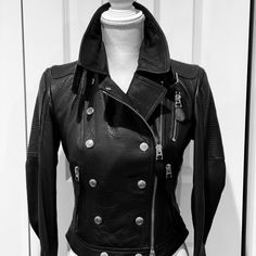 Burberry Brit Black Lambskin Moto Jacket- Size Us 4- Black Pebbled Lambskin, Antiqued Brass Zippers, Snaps And Buckles With Logo Insignia Throughout, Biker Style Jacket, Zippered Arm Cuffs, Three Front Zippered Pockets, Waist Detail On Back With Logo Buckles, Collar Can Be Worn Several Ways - Traditional Burberry Blue Plad Logo Lining- Pristine - Tags - Never Worn Bust 34", Shoulders 15", Sleeves 14", Waist 30", Length 20" - 21" This Is Amazing Jacket - Great Find. Price Firm Designer Fitted Biker Jacket For Events, Luxury Fitted Leather Jacket For Biker Events, Luxury Long Sleeve Biker Jacket For Biker Events, Luxury Fitted Outerwear For Biker Events, Luxury Fitted Biker Jacket, Luxury Fitted Long Sleeve Biker Jacket, Designer Fitted Black Biker Jacket, Designer Black Fitted Biker Jacket, Luxury Women's Biker Jacket With Zipper Closure