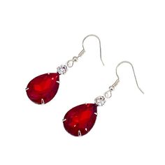 "Classy and elegant red glass faceted crystal teardrop earrings in beautiful silver finish. Crafted from brass and sparkling crystals, these red teardrop earrings are dazzling. Lightweight and comfortable red glass gem earrings can be easily secured with lead and nickel free brass earring hooks. Measurements(approx,see 3rd photo) Length:1.75\" Crystals:28 x 13 mm" Red Drop Crystal Earrings As Gift, Elegant Red Drop Crystal Earrings, Red Teardrop Drop Earrings, Red Teardrop Crystal Earrings, Elegant Red Teardrop Earrings With Ear Wire, Red Ruby Drop Earrings, Red Pear-shaped Earrings For Gift, Red Ruby Pear-shaped Earrings, Red Teardrop Earrings As A Gift