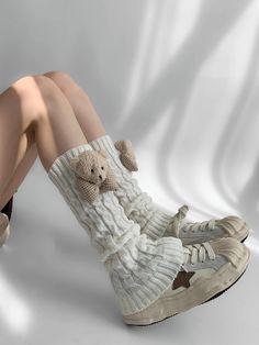 Embrace the kawaii fashion trend with these irresistibly cute knit leg warmers, embellished with charming teddy decorations. Available in three versatile colors—Khaki, Coffee, and White—these leg warmers are the perfect blend of style and comfort. Garment SizeSizeFree SizeFull Length40.5Cuff16/18 Casual White Knitted Socks, Trendy Cream Socks For Winter, Trendy Cream Winter Socks, Cute White Leg Warmers For Fall, Casual Beige Knitted Leg Warmers, Casual Chunky Knit Leg Warmers, Cute Leg Warmer Outfits, Shoes With Leg Warmers, Legwarmers Aesthetic