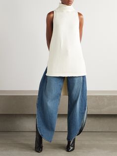 Alaïa offers a playful take on proportions with these high-rise jeans. Made from denim that's faded for a vintage feel, they have a voluminous barrel shape with leg-baring side slits and gently tapered cuffs. Wear your top tucked in to showcase the stitched detailing at the back. Tunic And Jeans, White Barrel Jeans Outfit, High Rise Jeans Outfit, Barrel Pants, Style Definition, Wool Turtleneck Sweater, Winter Fit, Exclusive Dress, Wool Turtleneck