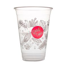 a plastic cup with an image of leaves and berries on the bottom, says good times