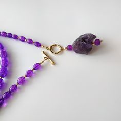 < Long glass beaded necklace with amethyst stone pendant > Very original and elegant combination. The stone is natural amethyst. Amethyst is the stone of St. Valentine and faithful love. It carries the energy of fire and passion, creativity and spirituality. This necklace can be beautiful accent to any look! > Necklace length - 89 cm (35 in) > Necklace weigth - 78 gm Lavender Crystal Necklaces With Faceted Beads For Gifts, Lavender Faceted Beads Crystal Necklace Gift, Spiritual Single Strand Purple Beaded Necklace, Purple Amethyst Faceted Bead Crystal Necklaces, Purple Amethyst Gemstone Beaded Necklaces, Purple Amethyst Crystal Necklaces With Faceted Beads, Lavender Amethyst Beaded Necklaces With Natural Stones, Purple Amethyst Pendant Beaded Necklace, Purple Amethyst Crystal Necklace With Faceted Beads