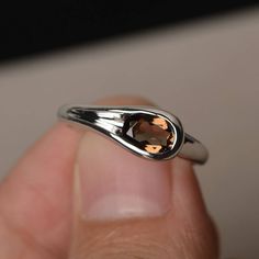 This is a gorgeous handmade creation. Its beauty is its simplicity & Elegance. The 5*7 mm oval shape faceted natural smoky quartz is crafted in solid sterling silver and with rhodium plated. All item is sent in a beautiful gift box If you have any idea of design your ring,pls contact me directly. You can realize more lovely stuff clicking the link https://www.etsy.com/shop/knightjewelry?refshopsection_shophome_leftnav Please leave the correct address and you phone number for delivering succe Solitaire Ring Oval, Smoky Quartz Ring, Brown Gemstone, Alexandrite Ring, Engagement Rings Oval, Ring Oval, Pink Gemstones, Quartz Ring, Pink Quartz