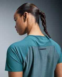 Balancing ultra-light protection with breathability and freedom. A running T-shirt that you can rely on, so you can focus on the run ahead. Blending high-tech fabrics with a minimalist design, this is an extremely lightweight top. All seams are taped, not stitched, so it feels like you're wearing nothing. It's Swiss-engineered to support your sprints, mid-distances, marathons and beyond. Running, unrestrained. Thanks to its sweat-wicking On DryTec™ fabric front, you'll stay fresh even while you Sports Top In Technical Fabric, Functional Sports Tops In Technical Fabric, Technical Sports Tops In Recycled Polyester, Sports Tops In Technical Fabric, Technical Sports Tops With Mesh Back, Breathable Recycled Polyester Training Tops, Compressive Breathable Green Tops, Breathable Recycled Polyester Tops For Training, Modern Short Sleeve Sports Top