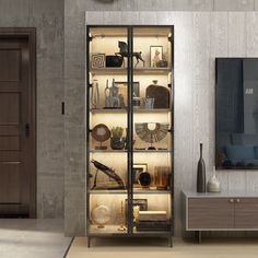 a living room with an entertainment center and large clock on the wall above it's glass doors