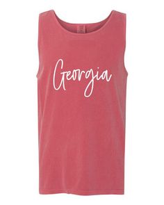 Warmer weather is here!! Throw on this cozy tank weather you're lounging at home, by the pool, or at the beach- this is sure to be any Georgia Bulldog's go-to shirt and coverup! I can do other schools/colors upon request!! COMFORT COLORS Crimson Model: C9360 Cotton: 100% Weight: 6.1 oz Sizes: XS, S, M, L, XL, 2XL, 3XL, 4XL See Similar Products Features Self-bound neck and armhole trim 6.1 oz. Double-needle stitched bottom hem Preshrunk, soft-washed, garment-dyed fabric 100% ringspun cotton Pair with a great insulated can holder https://etsy.me/2r48gD2 Follow us on Instagram @OakandMossClothing Post a photo of yourself in one of our items and tag us to be featured! HOW SOON WILL I HAVE IT?: Each shirt is made to order, and printed by hand. We need 4-6 business days to print and ship your or Cotton Tank Top For Beach Season Loungewear, Cotton Tank Top With Letter Print For Beach Season, Casual Tank Top For Beach Season And Loungewear, Casual Tank Top For Beach Season Loungewear, Moss Clothing, University Of Mississippi, Ole Miss, Georgia Bulldogs, Branded Shirts