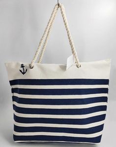 Enjoy a day at the beach or pool with our beach bag! Tulle Crafts, Striped Tote Bag, Bow Craft, Canvas Beach Tote, Fabric Rolls, Fuzzy Fabric, Nautical Outfits, Beach Totes, Totes Bag