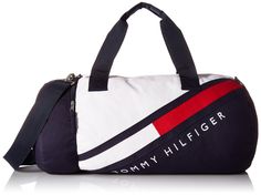 PRICES MAY VARY. Travel well, Tommy style. This sporty duffle bag from Tommy Hilfiger a must-have for hitting the road or just hitting the gym. Roomy and vibrant, it’s designed to stand up to anything you throw at, or in it. THE PERFECT FIT: Designed with two soft yet durable nylon handles, Tommy Hilfiger’s duffle bag for travel ensures you’re comfortable on the go thanks to a detachable, adjustable crossbody strap. TRAVEL LIGHT: Clever design gives Tommy’s travel duffle bags an ultra-lightweigh Bag For Travel, Diy Tote Bag, Travel Duffle, Duffle Bag Travel, Duffle Bags, Travel Duffel, Duffel Bag Travel, Sport Gym, Navy Blazer