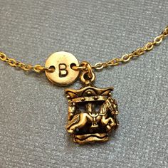 Carousel Charm bracelet with hand stamped initial.  Bracelet size is 6 1/2 inches with 2 inch extender. If you need a larger size please message me.  *Initial charm is antique gold pewter 9mm *Carousel charm is antique gold pewter *Your purchase will arrive packaged in a cute gift box and I will include a message by request. Add on a birthstone charm for $3.00 https://www.etsy.com/listing/235600956 *Go back to Toodaughters https://www.etsy.com/shop/Toodaughters Amusement Park Rides, Bracelet Initial, Cute Gift Boxes, Personalized Bracelet, Initial Bracelet, Personalized Bracelets, Birthstone Charms, Initial Charm, Cute Gift