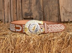 Unique handcrafted western leather belt with horse shoe design stitching and belt buckle Embroidered Brown Belt Buckle For Rodeo, Western Concho Belt Buckles For Country Events, Western Concho Belts For Ranch, Western Style Belts For Rodeo, Western Belts And Suspenders For Ranch, Western Antique Belt Buckle For Rodeo, Southwestern Antique Belt Buckle For Rodeo, Western Belts And Suspenders With Antique Buckle, Western Belts And Suspenders With Antique Buckle For Ranch