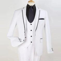 White Wedding Suit Groom This 2 Button Suit Comes In A Slim Fit, It Features A Matching Vest, Flat Front Pants, And Satin Trim Along The Lapel White Three-piece Wedding Suit, White Fitted Suit And Tie Accessories For Formal Occasions, Fitted White Tuxedo With Buttons, White Fitted Tuxedo With Buttons, Tailored White Suit For Groom, White Fitted Suit For Groom, White Fitted Suits For Groom, White Fitted Tuxedo Three-piece Suit, White Single Button Tuxedo With Suit Collar