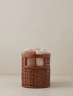 a basket that has some towels in it