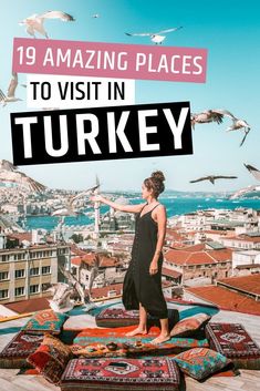 a woman standing on top of a rug with birds flying over her and the words 19 amazing places to visit in turkey