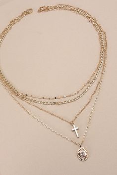 Multi-Layer Cross Oval Charm Necklace, a striking blend of faith and style, perfect for expression. ??This necklace features multiple layers adorned with intricately designed cross and oval charms, creating a captivating and meaningful accessory. Crafted with meticulous attention to detail and quality, each layer adds depth and dimension to the design, making it a versatile piece that complements any ensemble.?? Product Details:length: ??16", 17", 18", 19"charm: ??.75"ext: ??3" Ball Chain Extclasp: Lobster Clawmetal finish: ??Gold Platedproduct: Lead & Nickel Compliantanti-tarnish: Double E-coating Cross Necklace | Chain | Religious Necklace | Layered Necklace | Gold Necklace | Gold | Rhinestones | Simple | Pendent | Charm | Cross | Stacking Necklaces | Mom | Mama | Gift | Necklace | Sprin Layer Oval, Stacking Necklaces, Layered Cross Necklace, Layered Crosses, Necklace Layered, Stacked Necklaces, Gold Cross Necklace, Gold Charm Necklace, Gold Necklace Layered