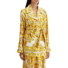 This silk twill pajama shirt, featuring the iconic majolica print, pays tribute to the rich history and exquisite craftsmanship of Italian culture. The bright lemon yellow hue and pure white accents evoke the summer light shining on the traditional Sicilian homes overlooking the sea. With its bold color detailing and feminine design, this piece effortlessly embodies the aesthetic values of Dolce&Gabbana. Don't miss the opportunity to add this belted pajama shirt to your collection, complete with Majolica Print, Makeup Travel Case, Summer Light, Italian Culture, Plastic Pollution, Feminine Design, Light Summer, White Accents, Silk Twill