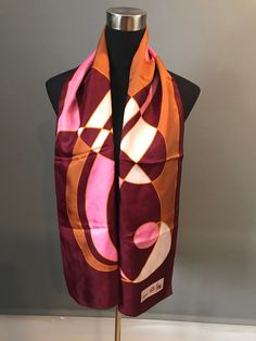 "Absolutely fabulous, mod scarf by Creation Elle Aime Paris in a pink, gold and magenta colorways. The scarf measures approximately 60\" x 14\". Signed \"Creation Elle Aime\". Tag is missing. In excellent vintage condition. FREE SHIPPING EVERYWHERE Prices are listed for Canada and USA only but if you wish to have them shipped elsewhere, please message me the shipping address and I will gladly send you a quote. We proudly reuse shipping material when we can to cut down waste to prevent our belove Vintage Pink Silk Scarves, Pink Vintage Silk Scarves, Pink Silk Vintage Scarves, Vintage Pink Silk Scarf, Gold And Magenta, Hot Pink Scarf, Retro Scarf, Art Scarves, Absolutely Fabulous